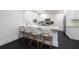 Bright kitchen features a breakfast bar with seating and stainless steel appliances at 1433 Park N St, St Petersburg, FL 33710