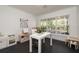 Sunlit playroom featuring ample space, large windows, and versatile furniture for creative and engaging activities at 1433 Park N St, St Petersburg, FL 33710