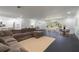Bright living room featuring recessed lights, a comfortable couch, and large windows at 1433 Park N St, St Petersburg, FL 33710