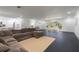 Spacious living area with a comfortable sectional sofa, hardwood floors, and an open layout at 1433 Park N St, St Petersburg, FL 33710
