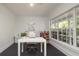 Bright, open home office with large windows, modern furniture, and ample space for work or study at 1433 Park N St, St Petersburg, FL 33710
