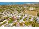 Overhead view of the property highlighting its neighborhood and the proximity to a school at 1521 San Helen Dr, Dunedin, FL 34698