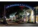 Nighttime view of Dunedin's downtown area with patriotic decorations and charming architecture at 1521 San Helen Dr, Dunedin, FL 34698