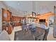 Open-concept living room with a view of the kitchen, dining area, and a glimpse into a bedroom at 1647 Emerald Dunes Dr, Sun City Center, FL 33573