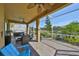 Outdoor space offering a jacuzzi, seating, and views of the backyard and surrounding greenery at 1647 Emerald Dunes Dr, Sun City Center, FL 33573