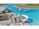 The waterslides and obstacle courses are fun attractions for everyone to enjoy by the beach at 16646 Maude Dr, Wimauma, FL 33598