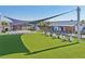 Enjoy outdoor movies and events on the well-manicured lawn, complete with seating and an outdoor refreshment bar at 16646 Maude Dr, Wimauma, FL 33598