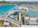 The community waterslide is a fun attraction for everyone to enjoy by the beach at 16646 Maude Dr, Wimauma, FL 33598