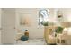 Bright Bedroom with a wooden crib and calming decor, perfect for a peaceful environment at 18453 Serene Lake Loop, Lutz, FL 33548