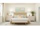 Serene main bedroom showcasing a woven headboard, neutral tones, and decorative bedside tables at 18453 Serene Lake Loop, Lutz, FL 33548