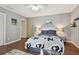 Neutral colored bedroom with hardwood floors and plenty of natural light at 18846 Tracer Dr, Lutz, FL 33549