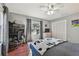 Bedroom with hardwood floors and an office area at 18846 Tracer Dr, Lutz, FL 33549