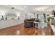 An elegant living room with hardwood floors and neutral tones create a warm and inviting atmosphere at 18846 Tracer Dr, Lutz, FL 33549