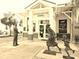 Exterior view of the Dunedin History Museum highlighting entrance and statues at 254 Seagate Ct, Dunedin, FL 34698