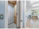 Garage featuring accessibility elevator and spacious, work-from-home flex space at 254 Seagate Ct, Dunedin, FL 34698