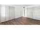 Spacious closet in a bedroom featuring hardwood flooring at 2650 Countryside Blvd # B102, Clearwater, FL 33761