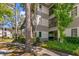 Exterior building shot shows the well maintained structure and landscaping at 2650 Countryside Blvd # B102, Clearwater, FL 33761