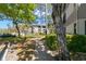Beautiful walking path through the landscaped grounds of the condo community at 2650 Countryside Blvd # B102, Clearwater, FL 33761