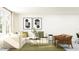 Bright living room featuring a modern sectional sofa, decorative artwork, and lots of natural light at 31794 Griffin Sands Ln, San Antonio, FL 33576