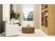 A cozy living room features a comfortable sofa, unique round coffee table, built in shelves and large windows at 31794 Griffin Sands Ln, San Antonio, FL 33576