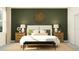 This bedroom features a large bed, nightstands, and a decorative wall hanging at 31794 Griffin Sands Ln, San Antonio, FL 33576