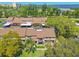 Aerial view of townhome complex, with lush green landscaping at 3632 Pine Cone Cir, Clearwater, FL 33760