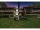 Charming townhome with manicured lawn and garden, creating a welcoming curb appeal at 3632 Pine Cone Cir, Clearwater, FL 33760