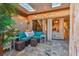 Inviting outdoor patio featuring a comfortable seating area, stylish decor, and a relaxing atmosphere at 3632 Pine Cone Cir, Clearwater, FL 33760
