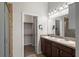 This bathroom has a double vanity with a walk-in closet connected at 4081 71St N Ter, Pinellas Park, FL 33781