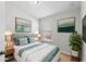Cozy bedroom featuring a comfortable bed, stylish decor, and ample natural light at 4081 71St N Ter, Pinellas Park, FL 33781