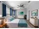 Bedroom features a ceiling fan, stylish decor, and ample natural light at 4081 71St N Ter, Pinellas Park, FL 33781