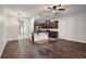 Open-concept living space featuring a modern kitchen, stylish tile floors, and ample natural light at 4081 71St N Ter, Pinellas Park, FL 33781