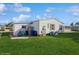 Spacious backyard featuring a shed and additional storage space for outdoor equipment at 443 Tuna Ct, Oldsmar, FL 34677