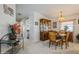 Cozy dining room adjacent to the hallway and kitchen at 443 Tuna Ct, Oldsmar, FL 34677