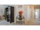 Hallway with stylish accents including a decorative console table with wine storage at 443 Tuna Ct, Oldsmar, FL 34677