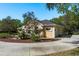 Charming home with well-maintained landscaping and a circular driveway, offering curb appeal at 6219 Riviera Ln, New Port Richey, FL 34655