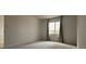 Bedroom featuring natural light and neutral carpet at 7529 Pitch Pine Cir # 190, Tampa, FL 33617