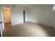 Bedroom with bright natural light and neutral carpet at 7529 Pitch Pine Cir # 190, Tampa, FL 33617