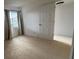 Bedroom featuring natural light and doorway at 7529 Pitch Pine Cir # 190, Tampa, FL 33617