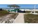 Beachside gazebo offering shaded seating with ocean views, a serene relaxation spot at 842 180Th E Ave, Redington Shores, FL 33708