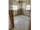 Partially renovated room with windows, block walls and concrete flooring at 842 180Th E Ave, Redington Shores, FL 33708