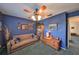 Bedroom featuring a sofa, a ceiling fan, and carpeted floors at 902 Chipaway Dr, Apollo Beach, FL 33572