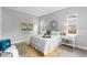 Cozy bedroom features stylish decor, light gray walls, and natural light, creating a relaxing ambiance at 9303 N 19Th St, Tampa, FL 33612