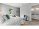 Cozy bedroom with stylish decor and an ensuite bath; perfect retreat at 9303 N 19Th St, Tampa, FL 33612
