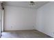 Spacious bedroom with a ceiling fan and neutral carpeting at 2105 Haydon Ct, Brandon, FL 33511
