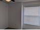 Standard bedroom with a ceiling fan, window and neutral walls at 2105 Haydon Ct, Brandon, FL 33511