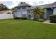 Charming single-story home with lush green lawn and decorative landscaping for pleasant curb appeal at 2105 Haydon Ct, Brandon, FL 33511