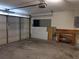 A spacious garage with a workbench providing ample space for projects and storage at 2105 Haydon Ct, Brandon, FL 33511