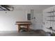 A spacious garage with a workbench, shelves providing ample space for projects and storage at 2105 Haydon Ct, Brandon, FL 33511