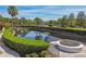 Scenic view of a community pond surrounded by lush landscaping and walking paths at 1035 Royal Pass Rd, Tampa, FL 33602